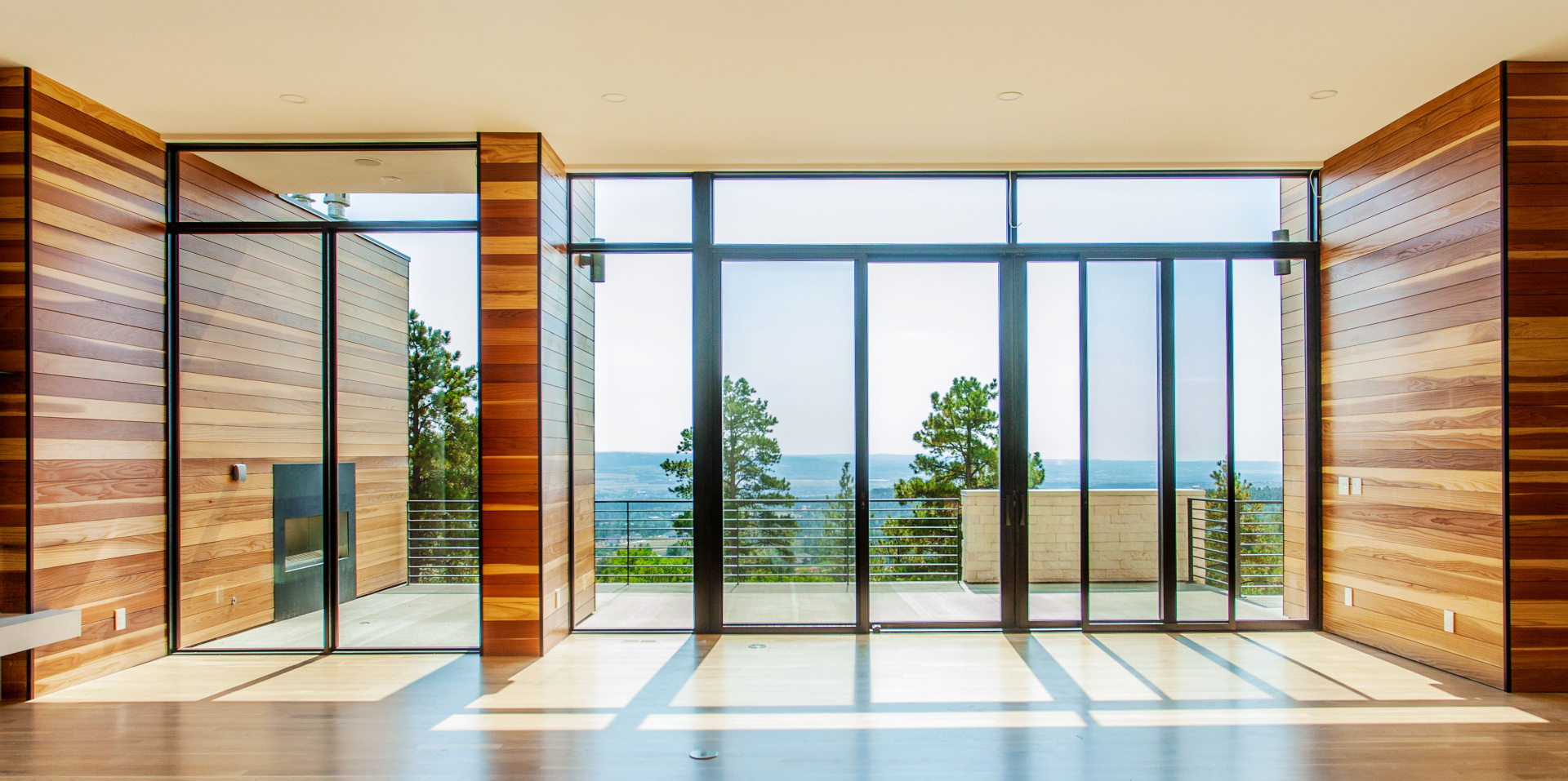 Home in Monument, Colorado features redwood pattern stock on the interior and exterior walls. 